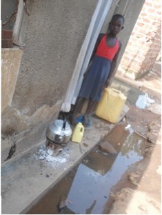 Juliet rests for a while before scooping more water out of their house1