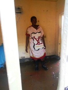 Mary stands in her former bedroom which she was forced to vacate because of the floods